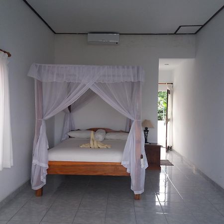 Warung Jemeluk & Home Stay Amed Esterno foto