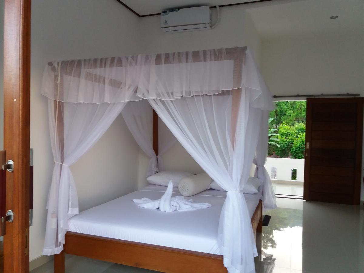 Warung Jemeluk & Home Stay Amed Esterno foto