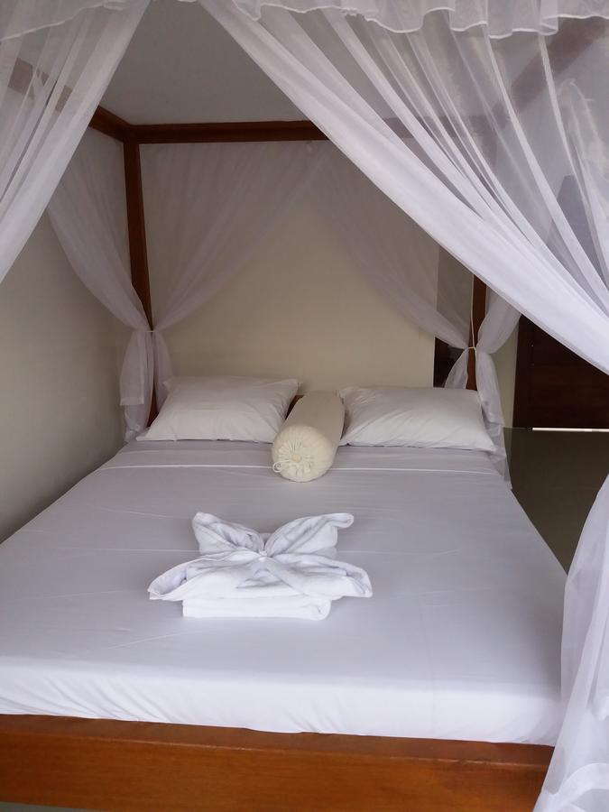 Warung Jemeluk & Home Stay Amed Esterno foto
