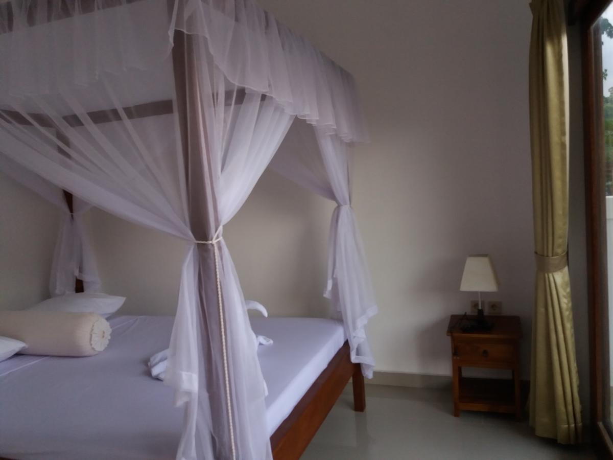 Warung Jemeluk & Home Stay Amed Esterno foto