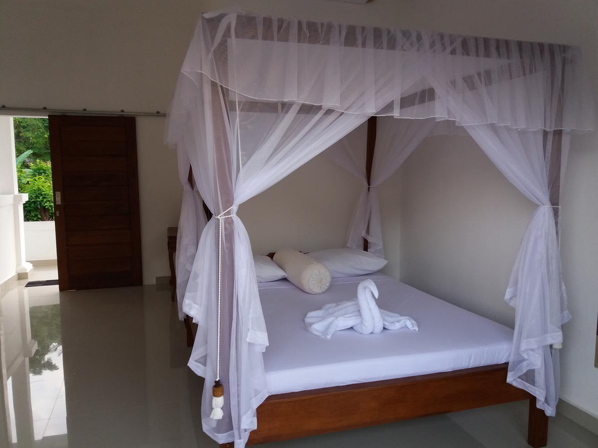 Warung Jemeluk & Home Stay Amed Esterno foto