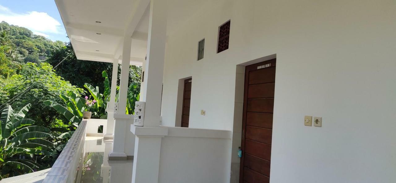 Warung Jemeluk & Home Stay Amed Esterno foto