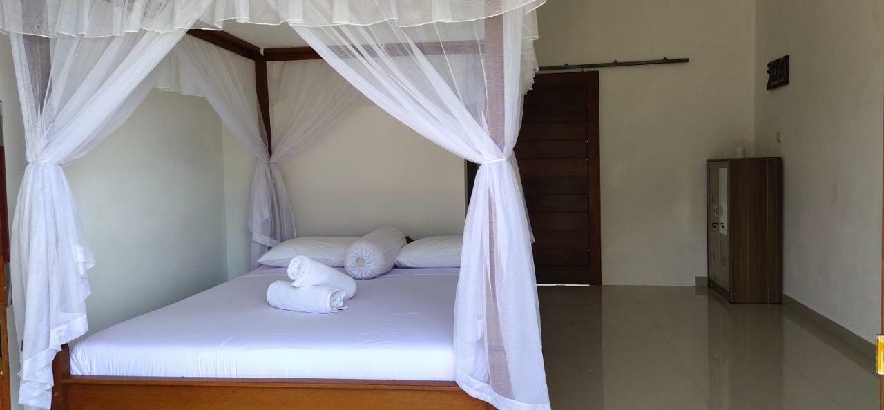 Warung Jemeluk & Home Stay Amed Esterno foto